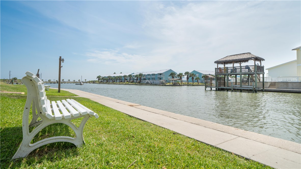 2290 North Fulton Beach Road Rockport, TX 78382 - Photo 5 of 26 a view of a swimming pool with a lake view
