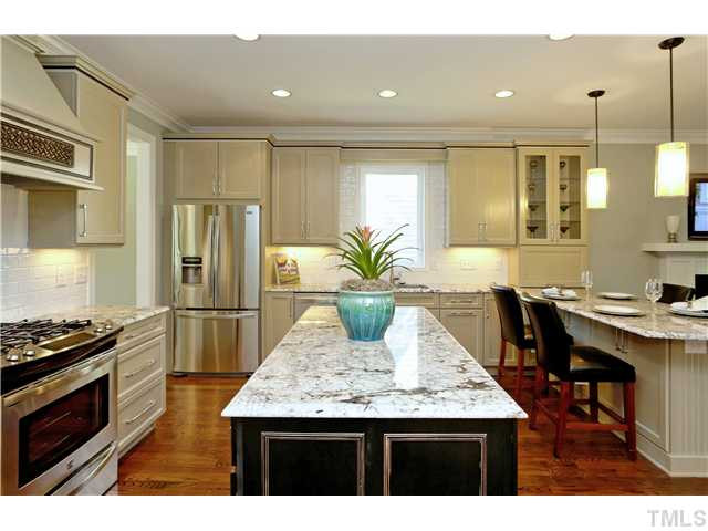 2320 Finley Ridge Lane Raleigh, NC 27615 - Photo 2 of 15 Still time to pick your cabinets and granite for home this home. This picture was taken in the Parade Home across the street and represents what the layout will look like in 2320 Finley Ridge. Parade Home Interior Designed By Connie Allen. Kitchen