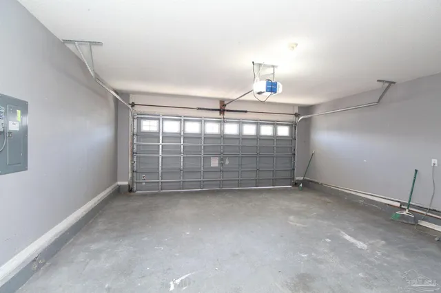 an empty room with a empty space and windows