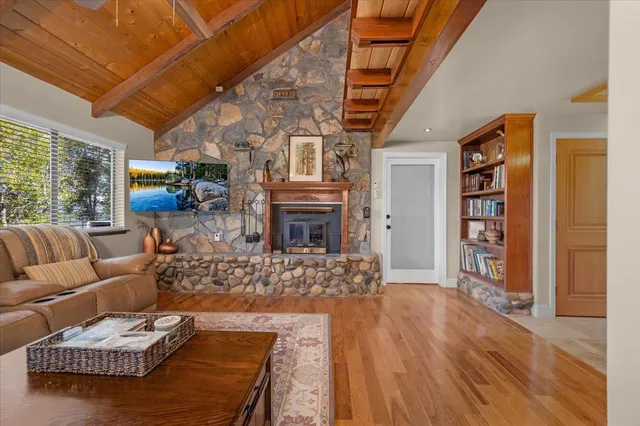 a kitchen with stainless steel appliances granite countertop a stove and a refrigerator