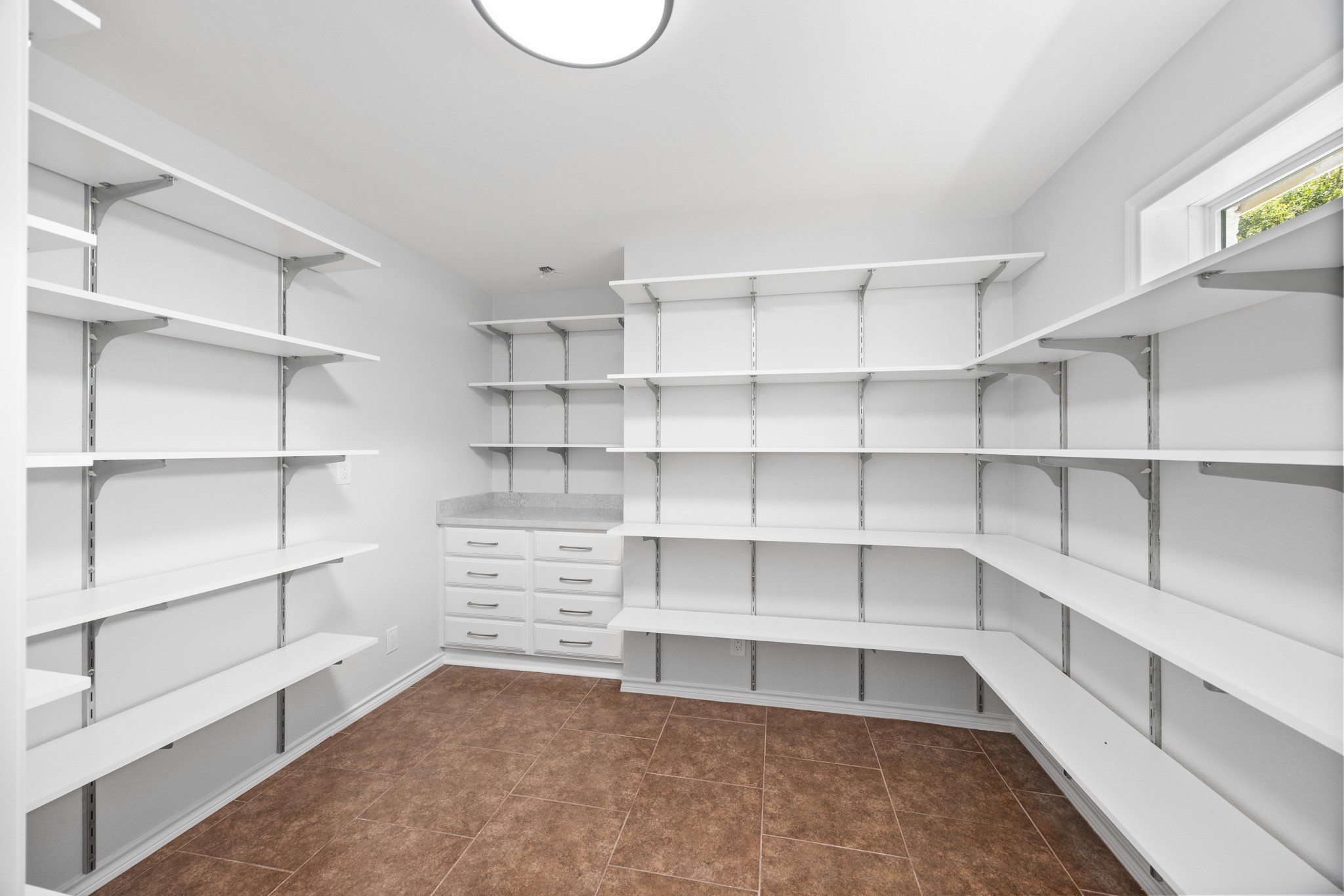 10209 Oberrender Road Needville, TX 77461 - Photo 21 of 50 Through hidden double doors is this custom built walk in pantry. Storage galore!