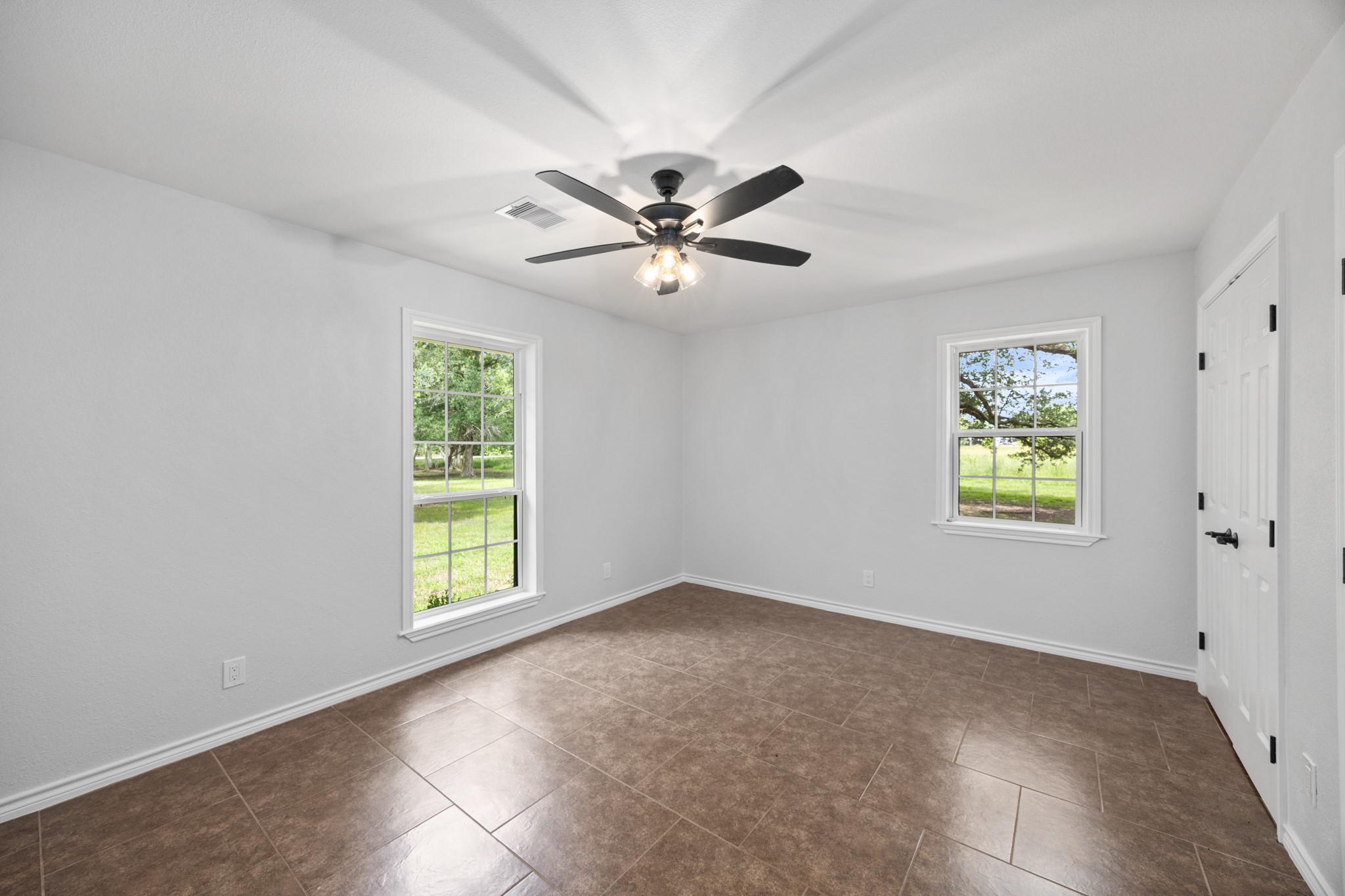 10209 Oberrender Road Needville, TX 77461 - Photo 27 of 50 2nd secondary bedroom is also just down the hallway.