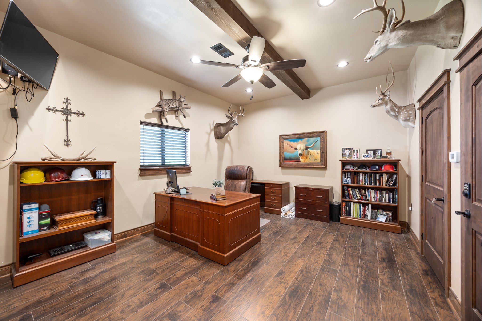 10209 Oberrender Road Needville, TX 77461 - Photo 43 of 50 A spacious home office has been custom built in the workshop! Spacious room with a large secure closet that can house your valuable sporting equipment. 2nd door also leads to an unfinished...but plumbed room.