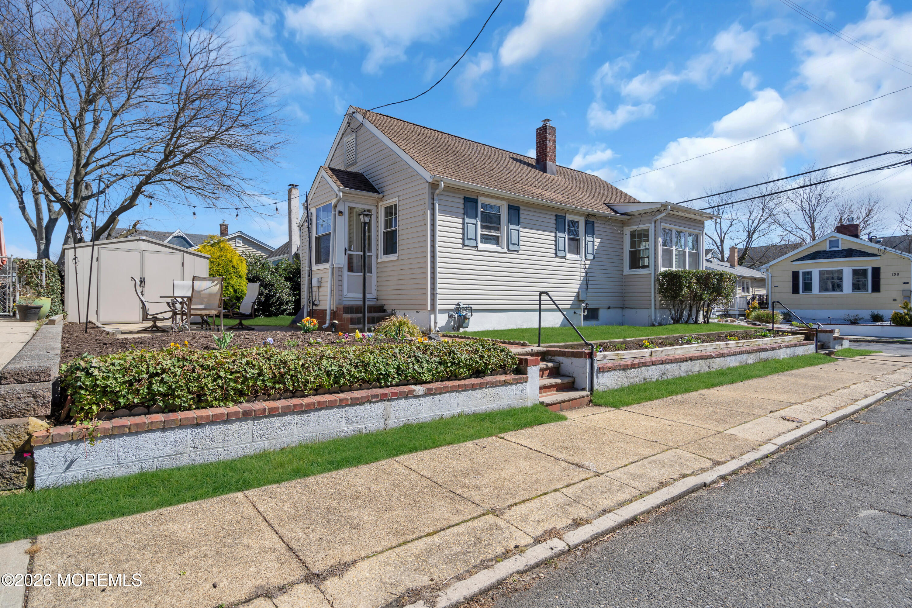 137 Inskip Avenue Ocean Grove, NJ 07756 - Photo 3 of 39 a front view of house with yard and green space