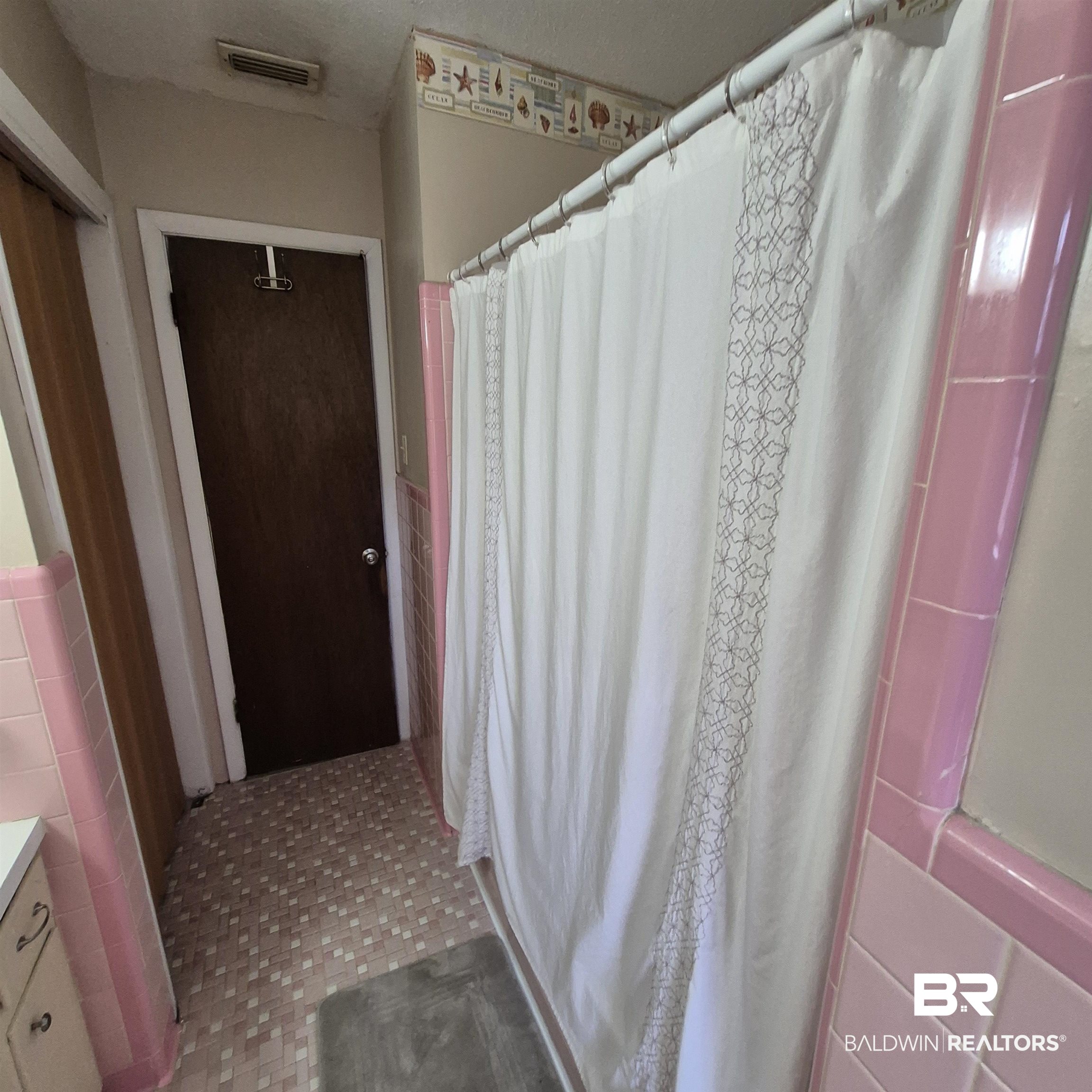 491 Forrest Avenue Castleberry, AL 36432 - Photo 19 of 33 Bathroom with vanity, a shower with curtain, and light flooring