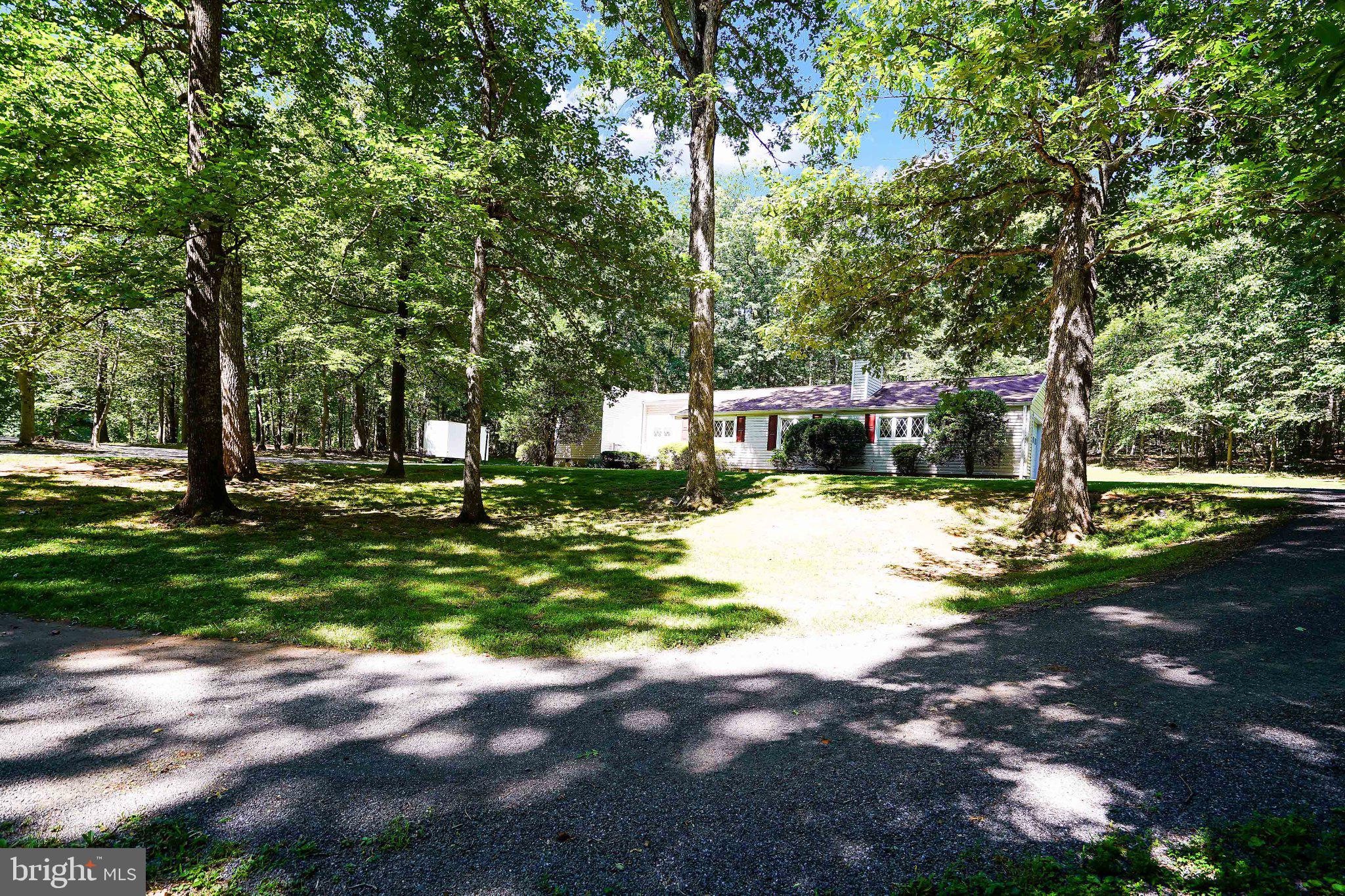 6067 Pilgrims Rest Road Broad Run, VA 20137 - Photo 46 of 58 Serene home nestled among lush trees.