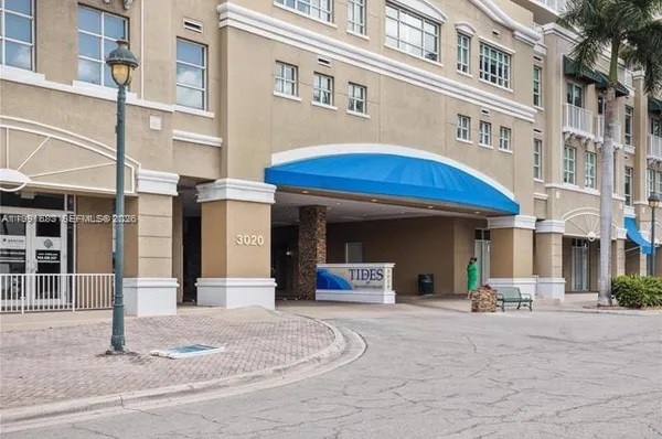 a view of a building with a entrance gate