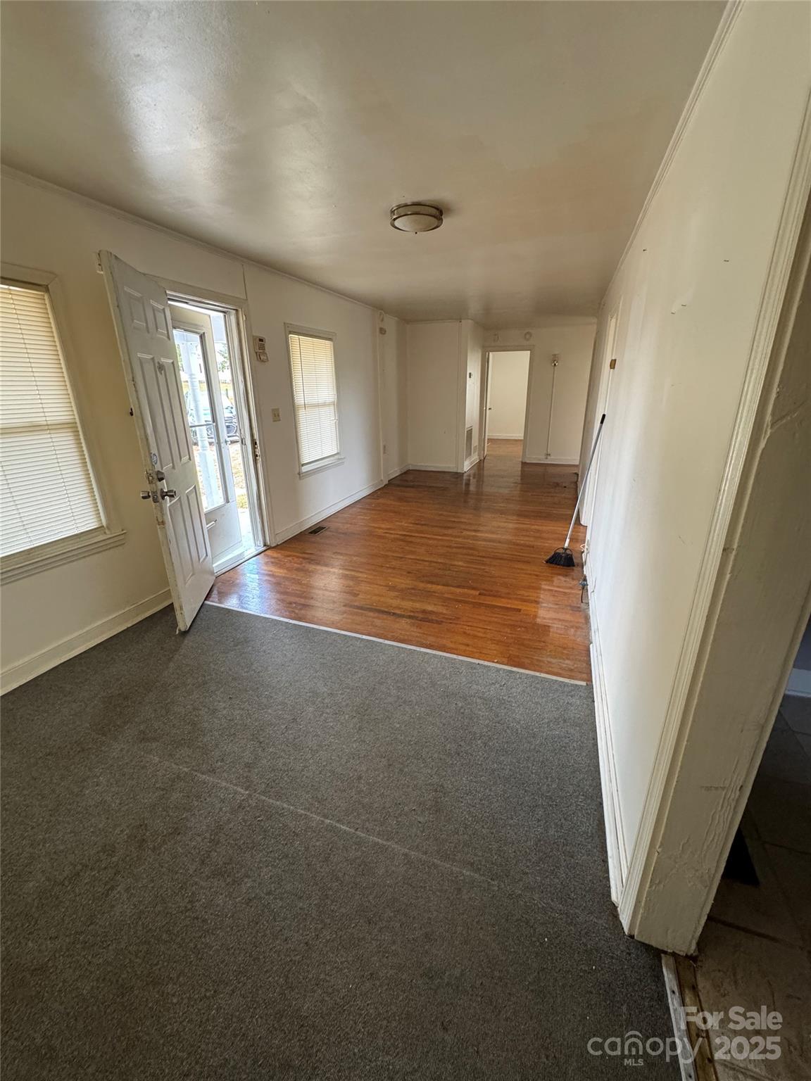 9697 Highway 52 Ansonville, NC 28170 - Photo 2 of 13 an empty room with windows
