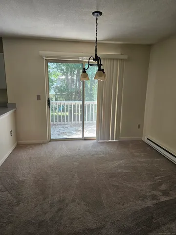 a view of empty room with windows