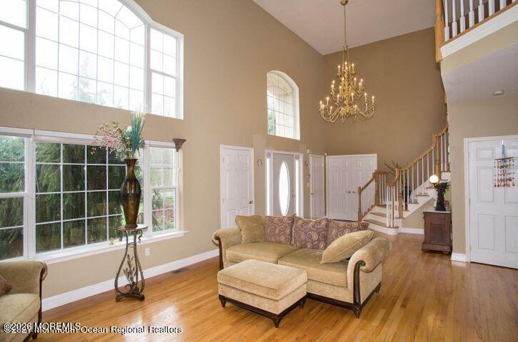 467 Leesville Road Jackson, NJ 08527 - Photo 2 of 19 a living room with furniture window and wooden floor