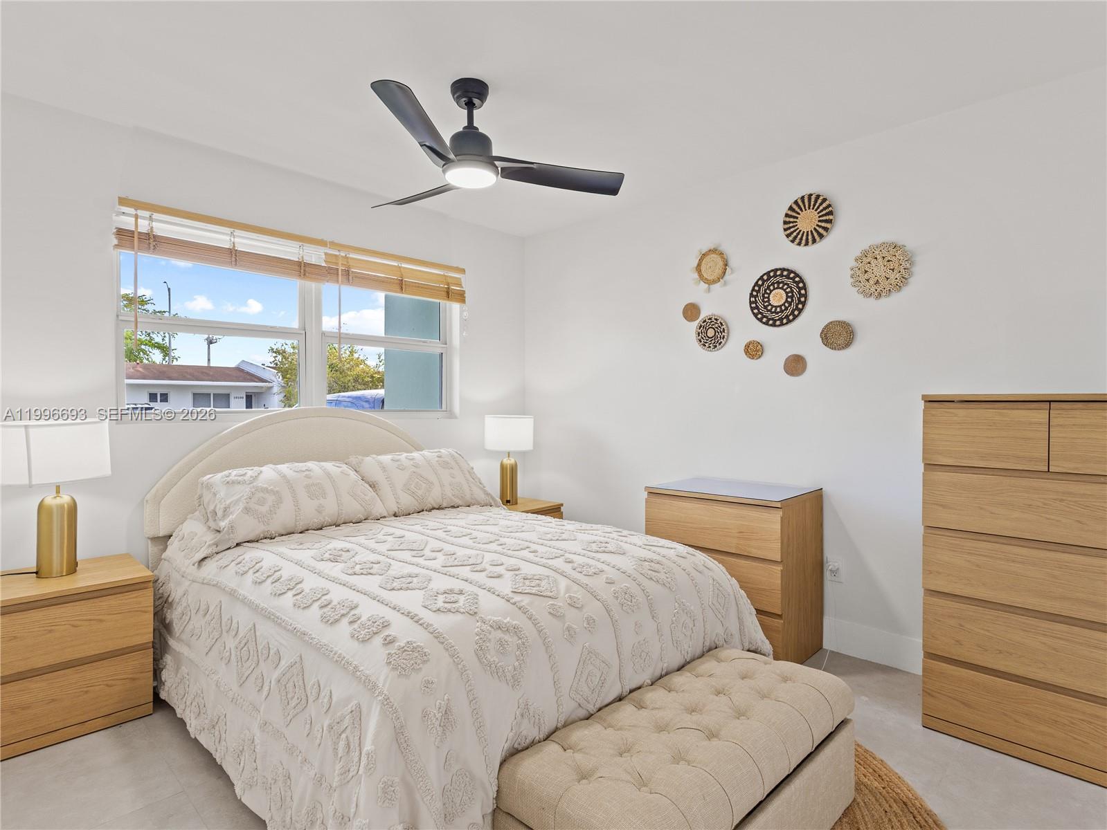 10017 Southwest 23rd Terrace Miami, FL 33165 - Photo 17 of 25 a bed room with two bed and a window