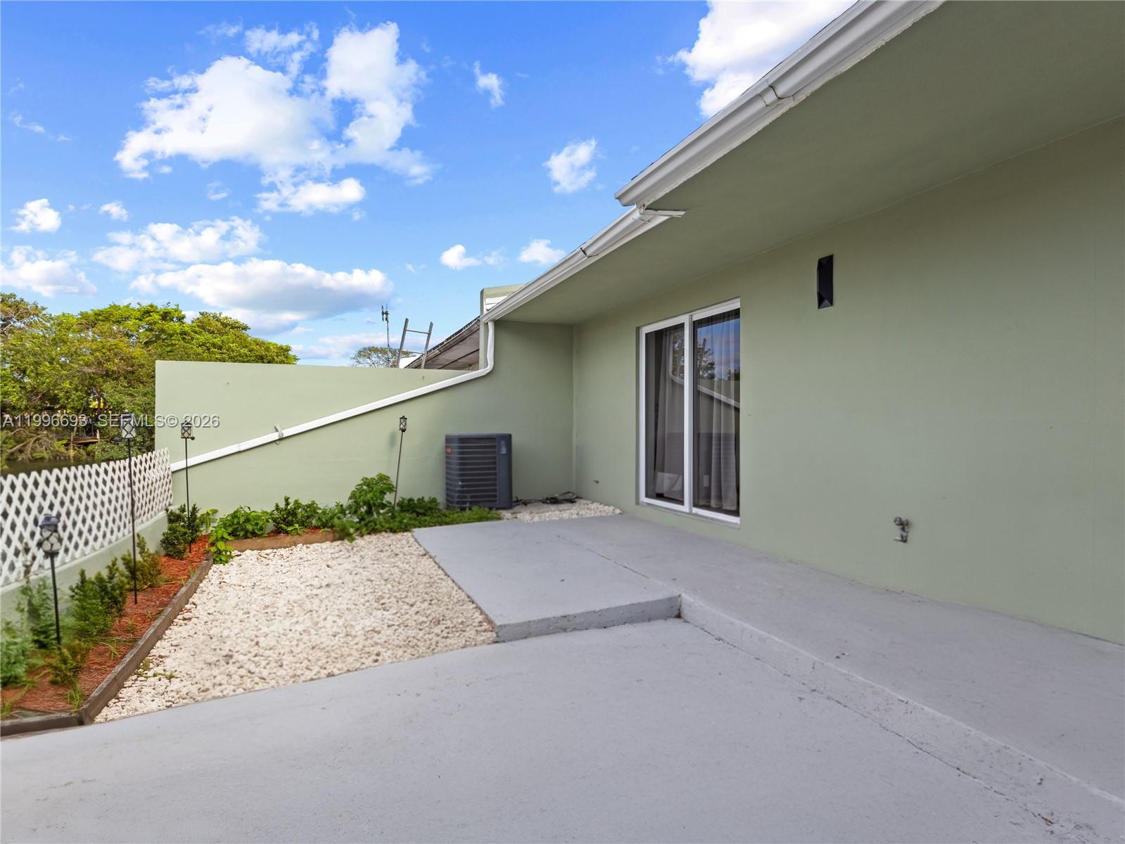 10017 Southwest 23rd Terrace Miami, FL 33165 - Photo 25 of 25 a view of a house with a street