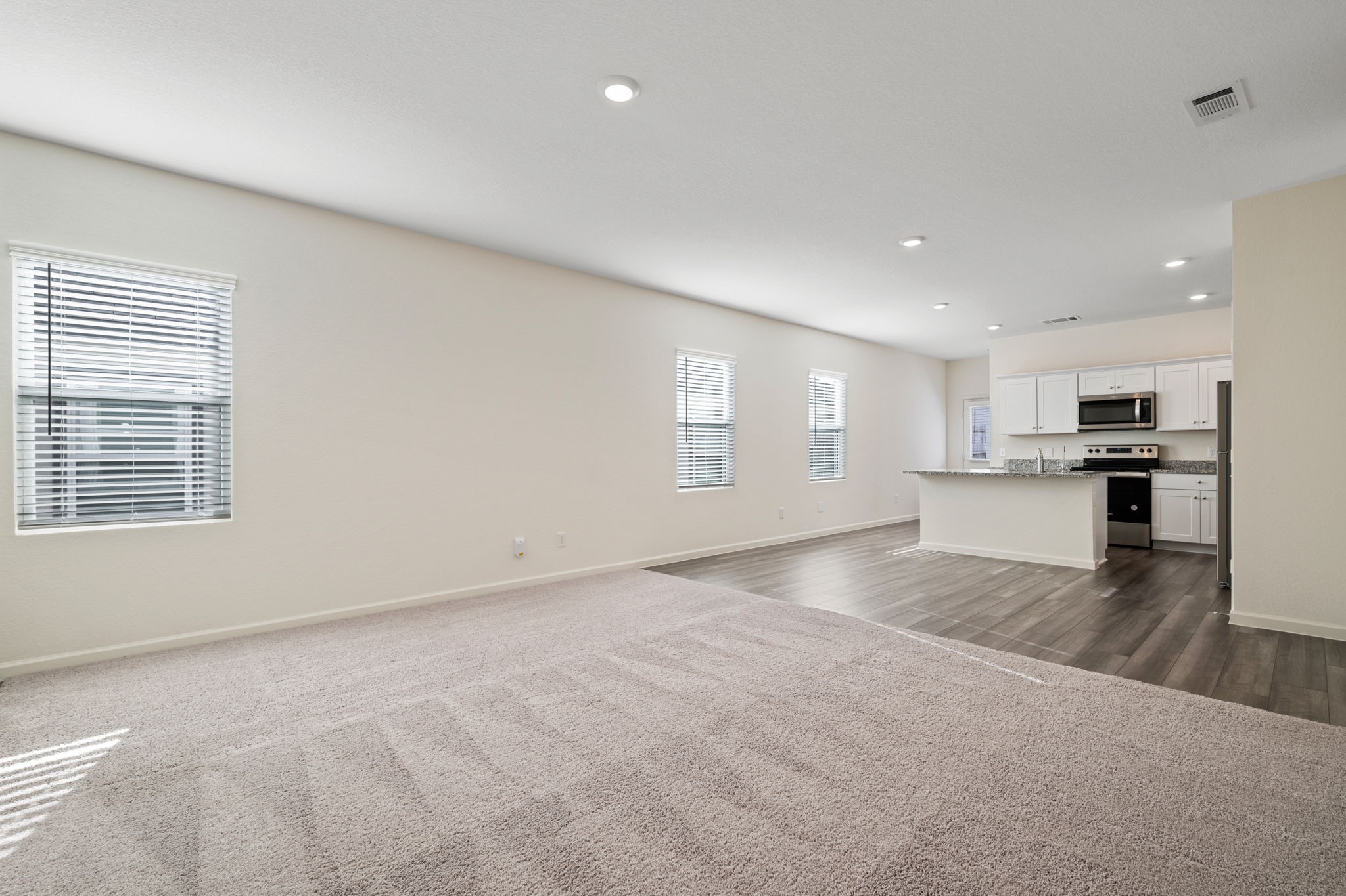 614 Edge Lake Court Montgomery, TX 77316 - Photo 12 of 27 a view of kitchen and wooden floor