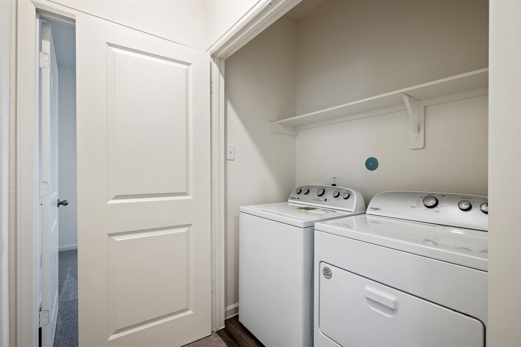 614 Edge Lake Court Montgomery, TX 77316 - Photo 19 of 27 a view of storage and utility room with washer and dryer