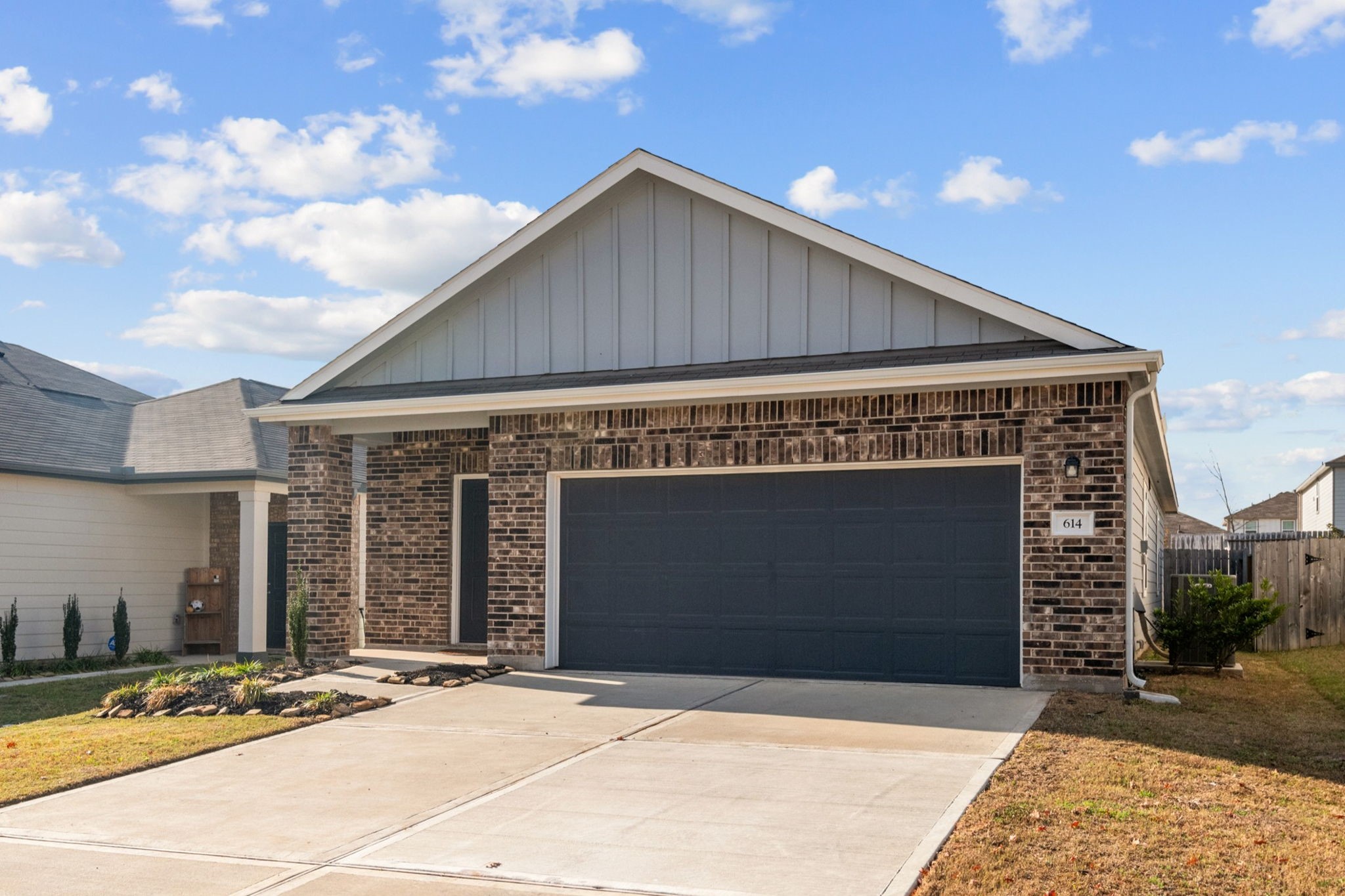 614 Edge Lake Court Montgomery, TX 77316 - Photo 25 of 27 a front view of a house with garage