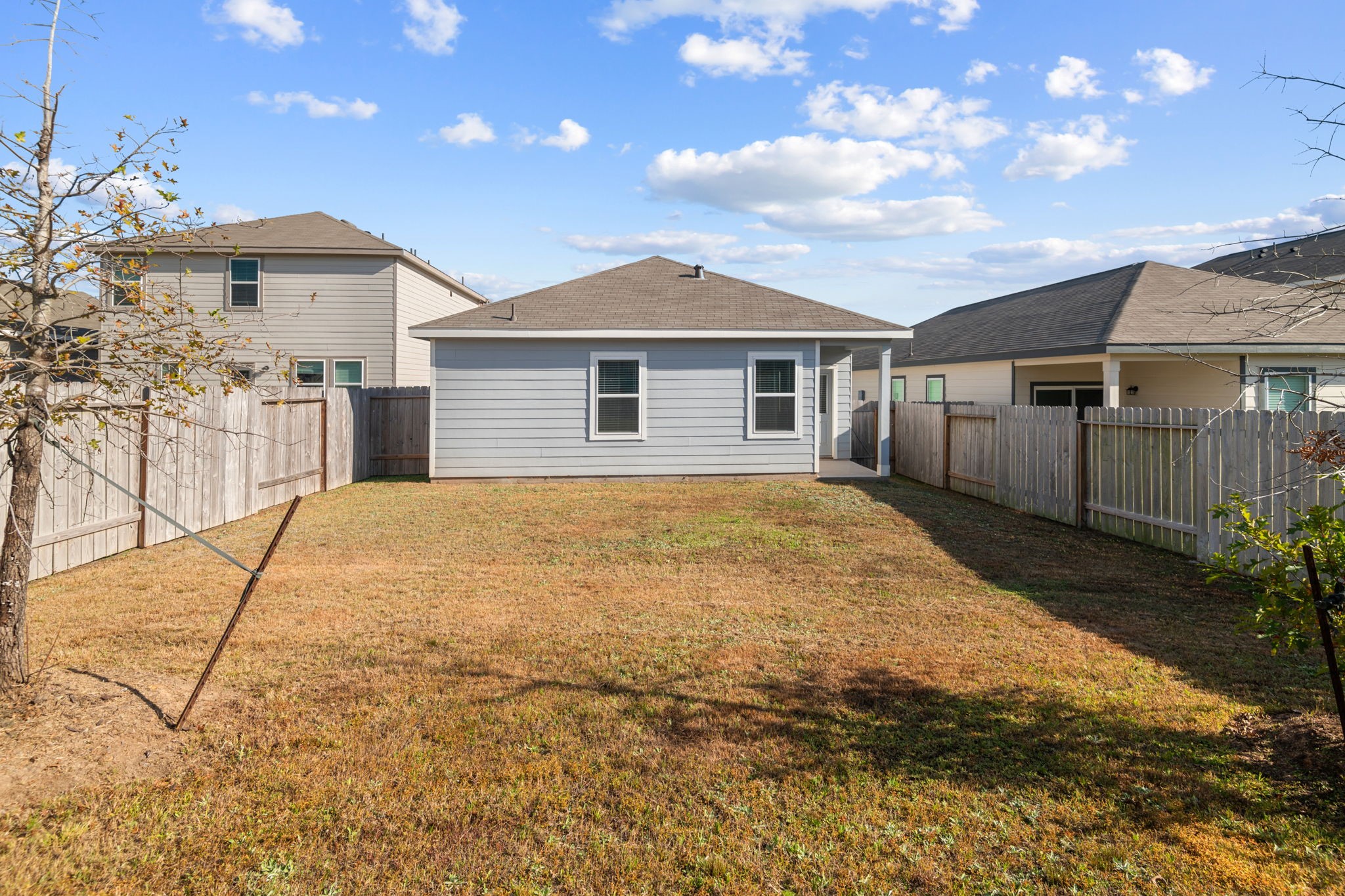 614 Edge Lake Court Montgomery, TX 77316 - Photo 26 of 27 a view of a house with a yard