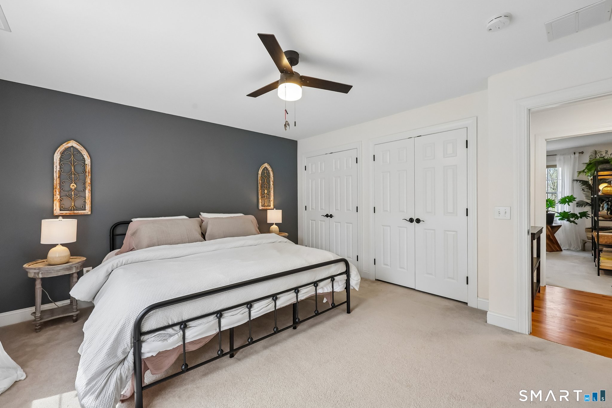3 East Lake Road Danbury, CT 06811 - Photo 27 of 37 Bedroom 3 is generously sized and easily accommodates a king-sized bed, with soft wall-to-wall carpeting adding warmth and comfort to the space.