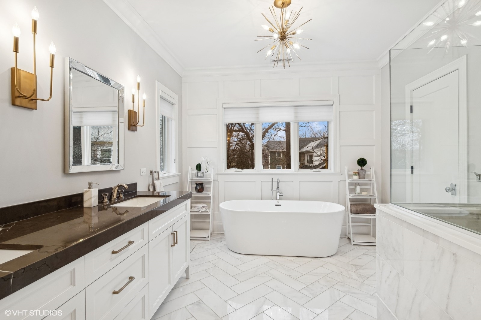 1401 Maple Avenue Wilmette, IL 60091 - Photo 13 of 46 a spacious bathroom with a double vanity sink a mirror and a bathtub