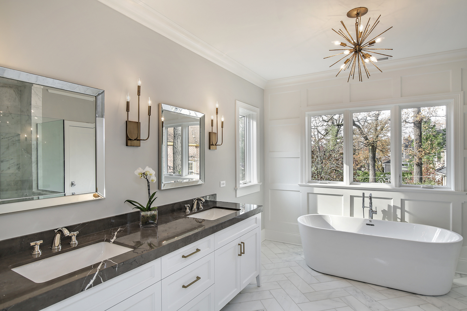 1401 Maple Avenue Wilmette, IL 60091 - Photo 14 of 46 a bathroom with a double vanity sink bathtub and next to a window