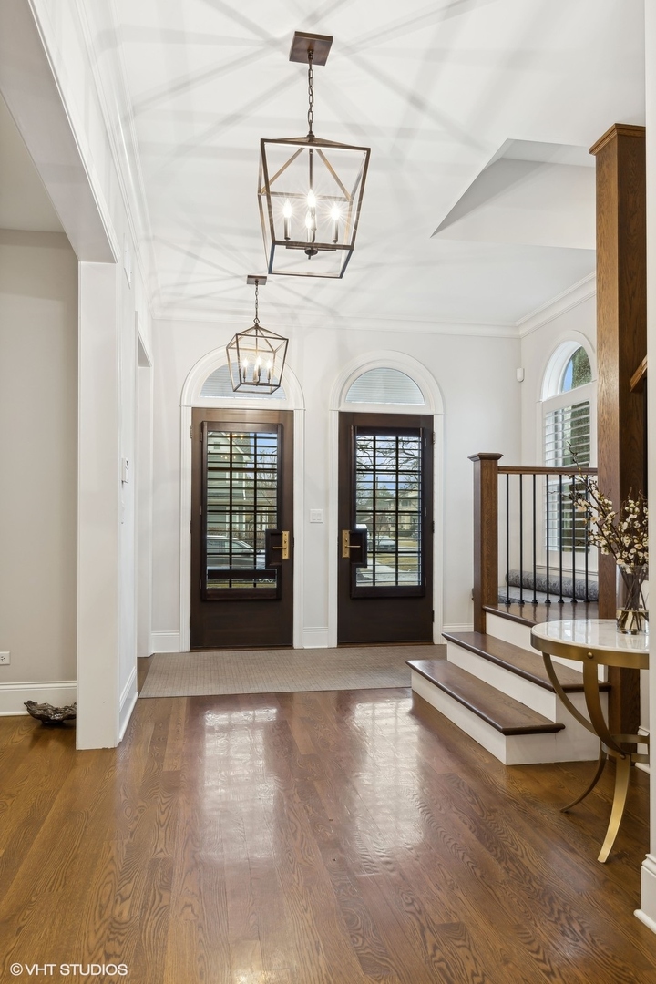 1401 Maple Avenue Wilmette, IL 60091 - Photo 17 of 46 a view of an entryway with wooden floor