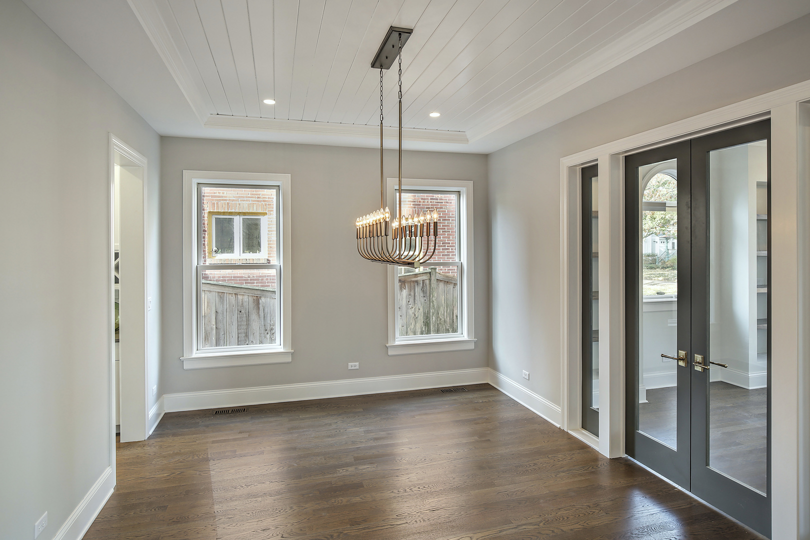 1401 Maple Avenue Wilmette, IL 60091 - Photo 22 of 46 a view of an empty room with wooden floor and a window