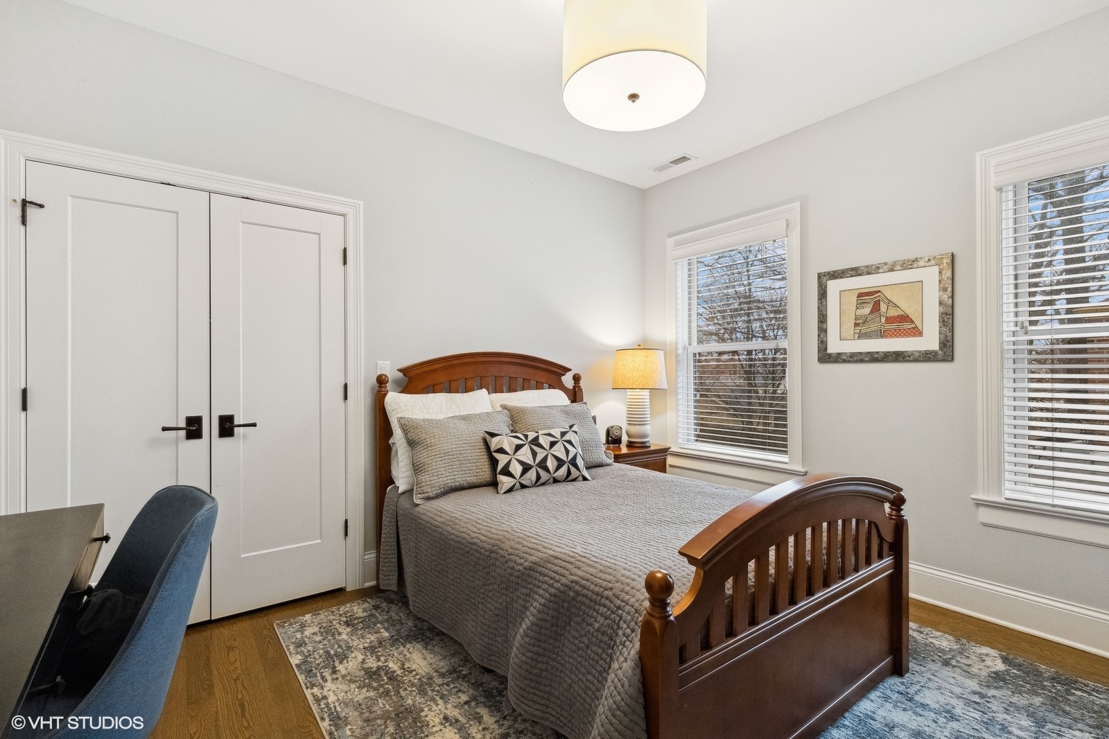 1401 Maple Avenue Wilmette, IL 60091 - Photo 32 of 46 a bedroom with a bed and wooden floor