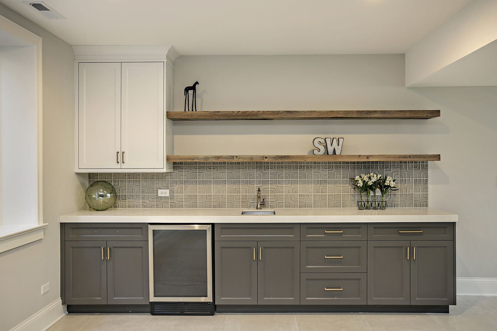 1401 Maple Avenue Wilmette, IL 60091 - Photo 40 of 46 a kitchen with a sink and cabinets