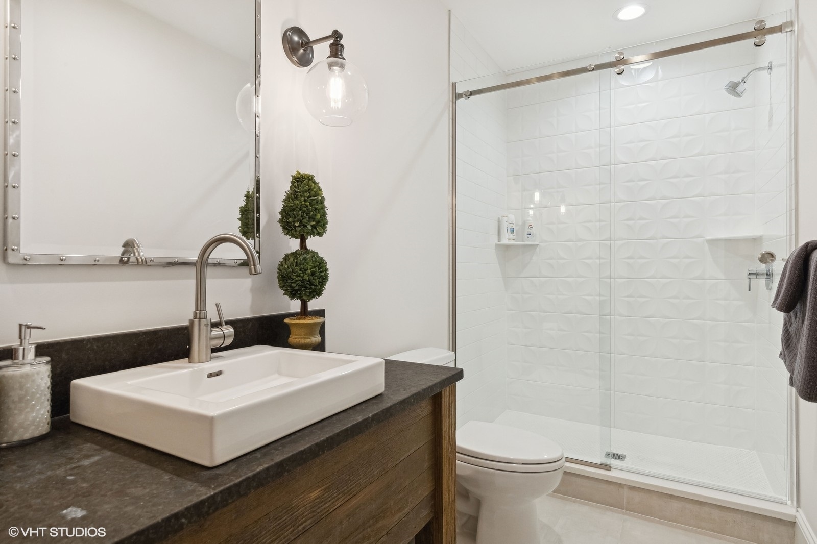 1401 Maple Avenue Wilmette, IL 60091 - Photo 42 of 46 a bathroom with a sink toilet and shower