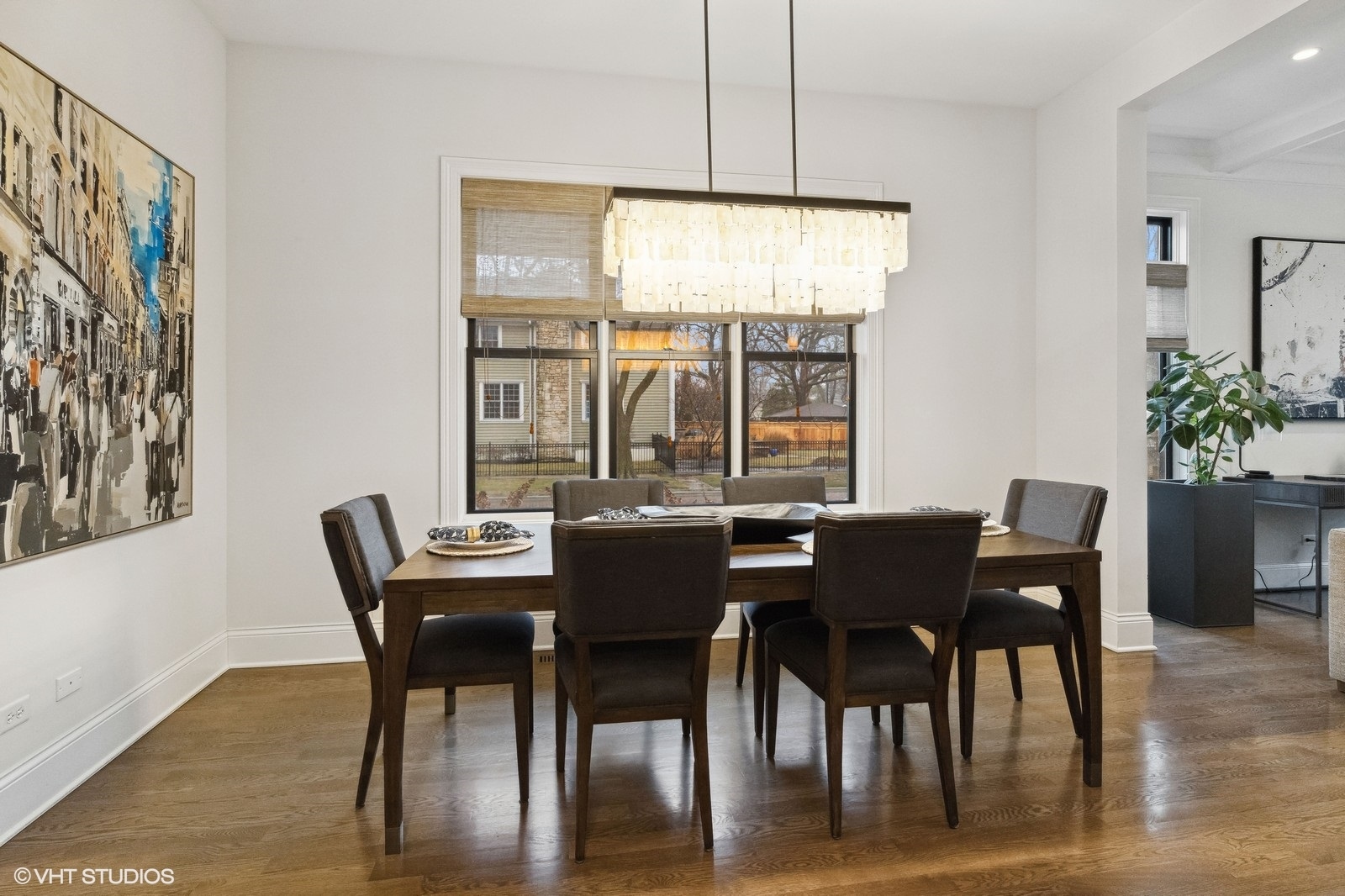 1401 Maple Avenue Wilmette, IL 60091 - Photo 9 of 46 a view of a dining room with furniture window and wooden floor