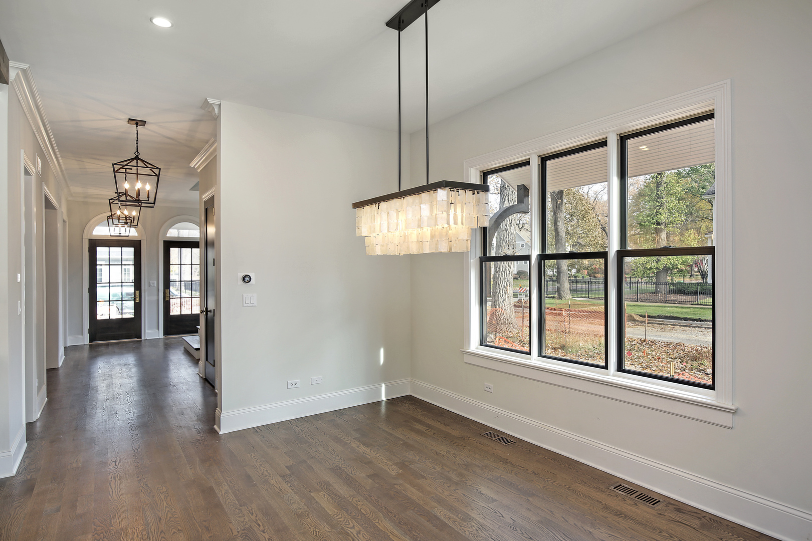 1401 Maple Avenue Wilmette, IL 60091 - Photo 10 of 46 a view of an empty room with wooden floor and a window