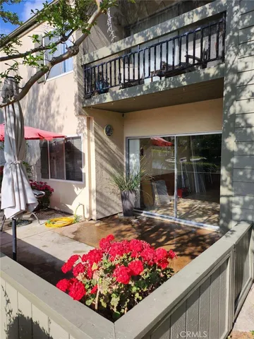 a room with gym equipment and a large window