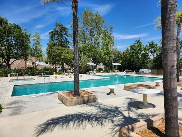 a view of a park with swings and slides