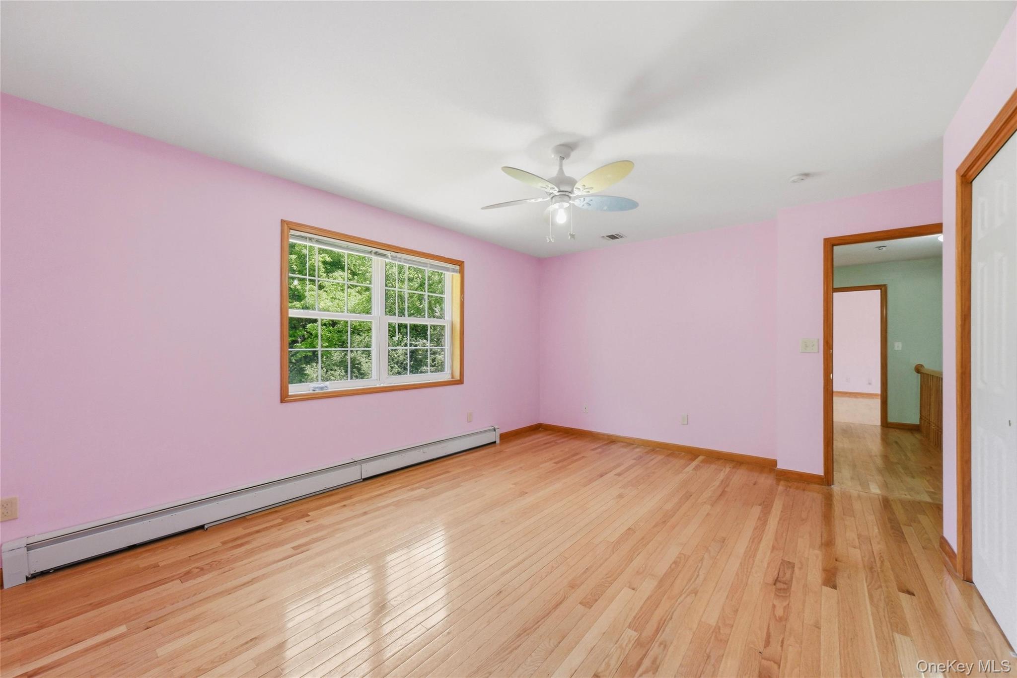 5 Horton Road Washingtonville, NY 10992 - Photo 25 of 42 a view of an empty room with a window and wooden floor