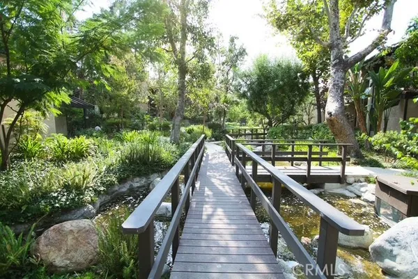 a view of a backyard with sitting area