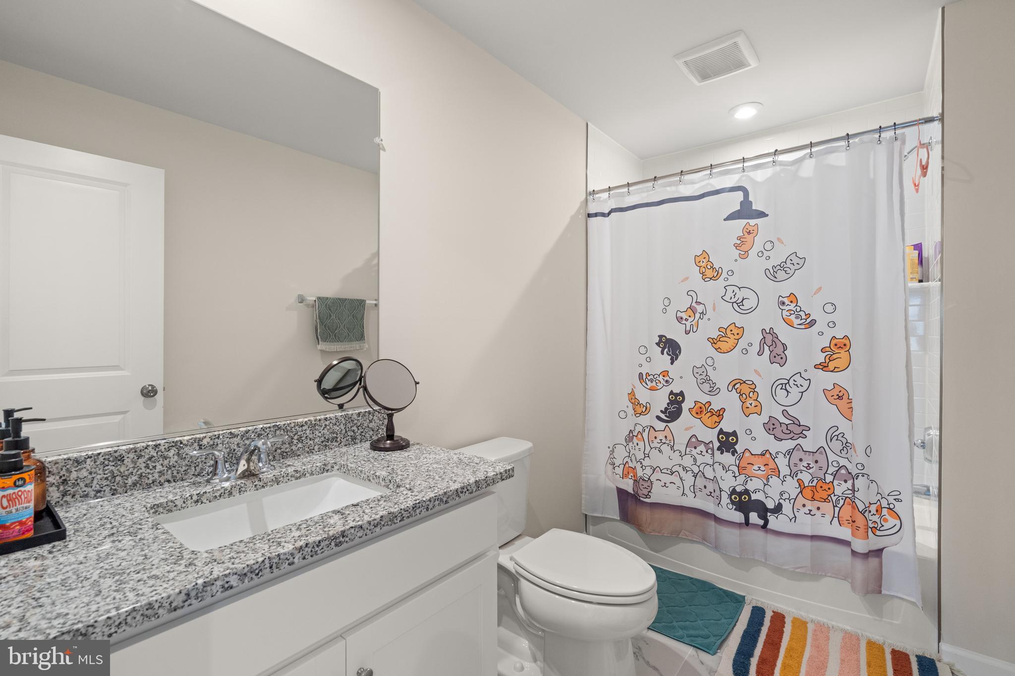 179 National Street Ranson, WV 25438 - Photo 28 of 37 a bathroom with a granite countertop sink toilet and shower