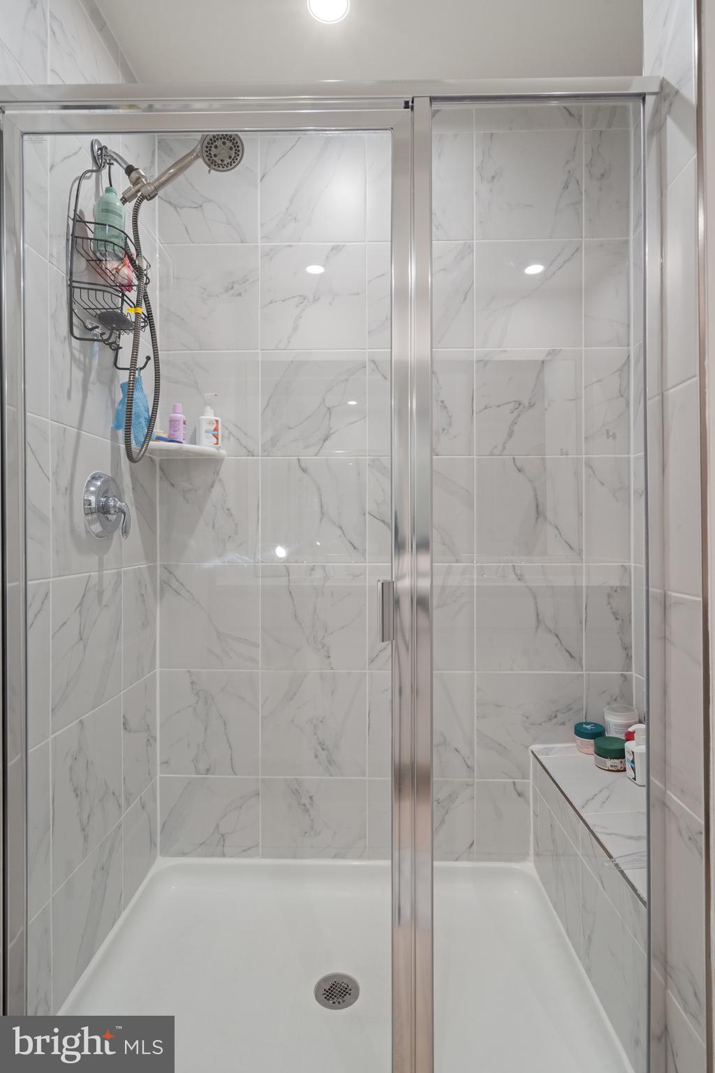 179 National Street Ranson, WV 25438 - Photo 35 of 37 a bathroom with a shower and a bath tub