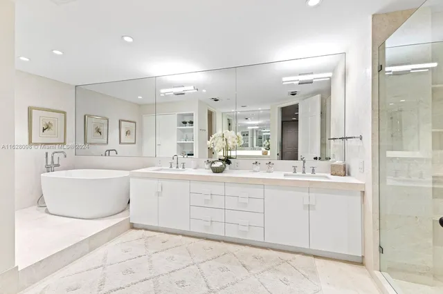 a living room with a fireplace and a mirror