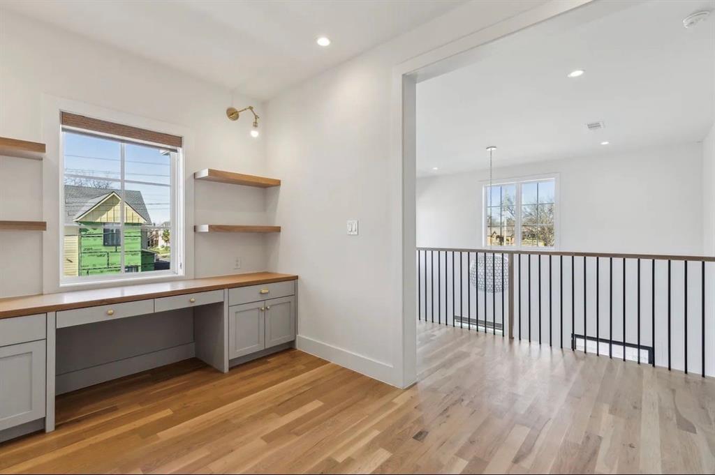 5800 Goodwin Avenue Dallas, TX 75206 - Photo 24 of 39 This versatile interior space features hardwood flooring, white walls, and recessed lighting for office or study room