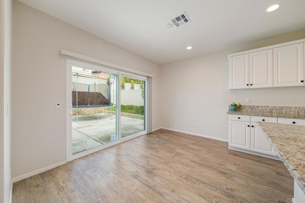 352 Misaki Way Fallbrook, CA 92028 - Photo 13 of 68 a view of a kitchen with a sink and a window