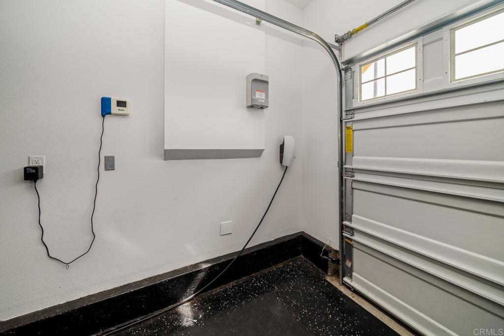 352 Misaki Way Fallbrook, CA 92028 - Photo 19 of 68 a room with rack on the wall and a window