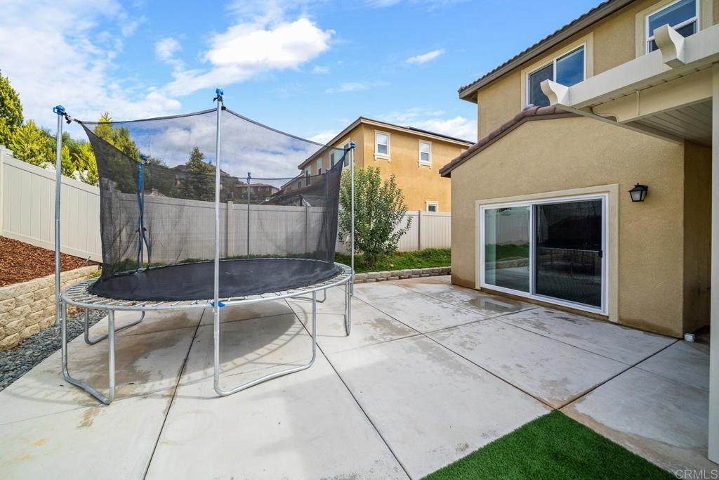 352 Misaki Way Fallbrook, CA 92028 - Photo 27 of 68 a view of a house with backyard and porch