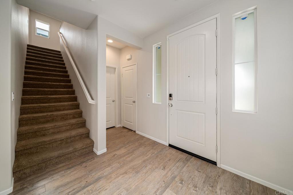 352 Misaki Way Fallbrook, CA 92028 - Photo 28 of 68 a view of an entryway with wooden floor
