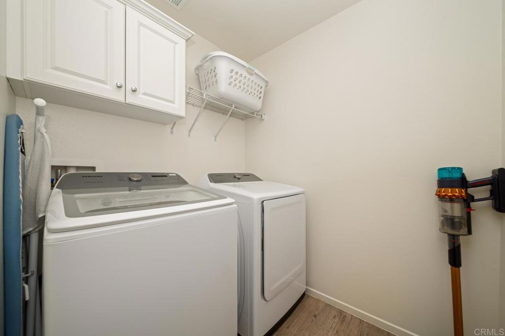 352 Misaki Way Fallbrook, CA 92028 - Photo 29 of 68 a view of storage and utility room with washer and dryer