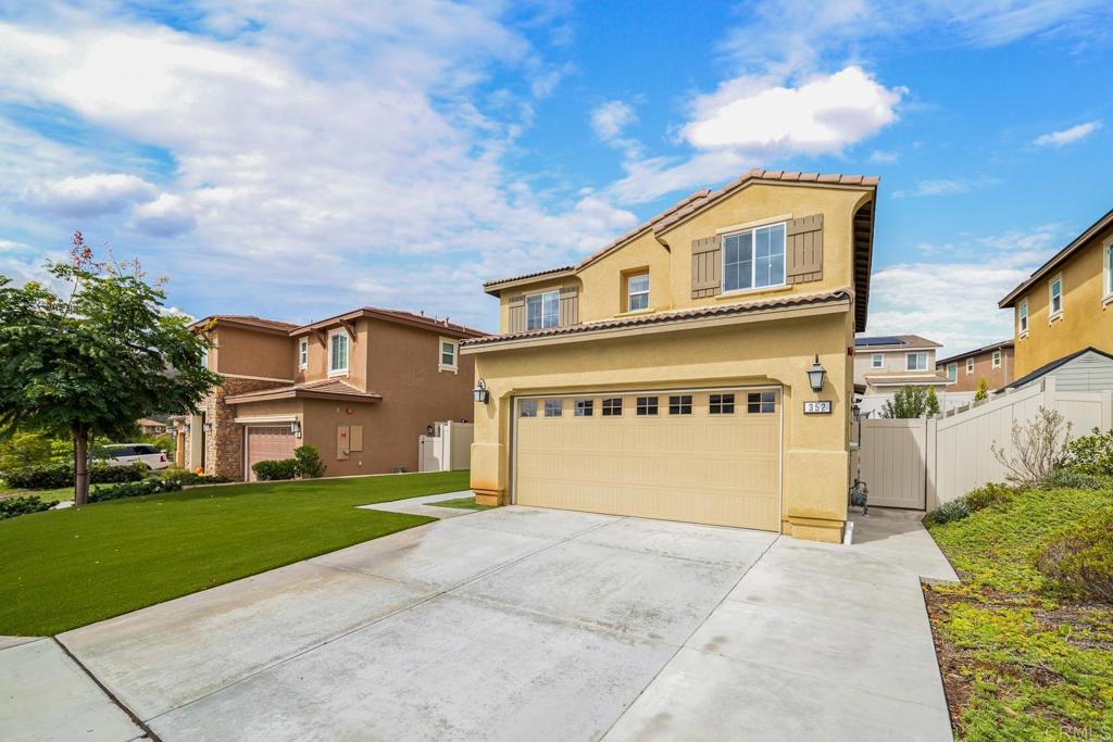 352 Misaki Way Fallbrook, CA 92028 - Photo 3 of 68 a front view of a house with a yard