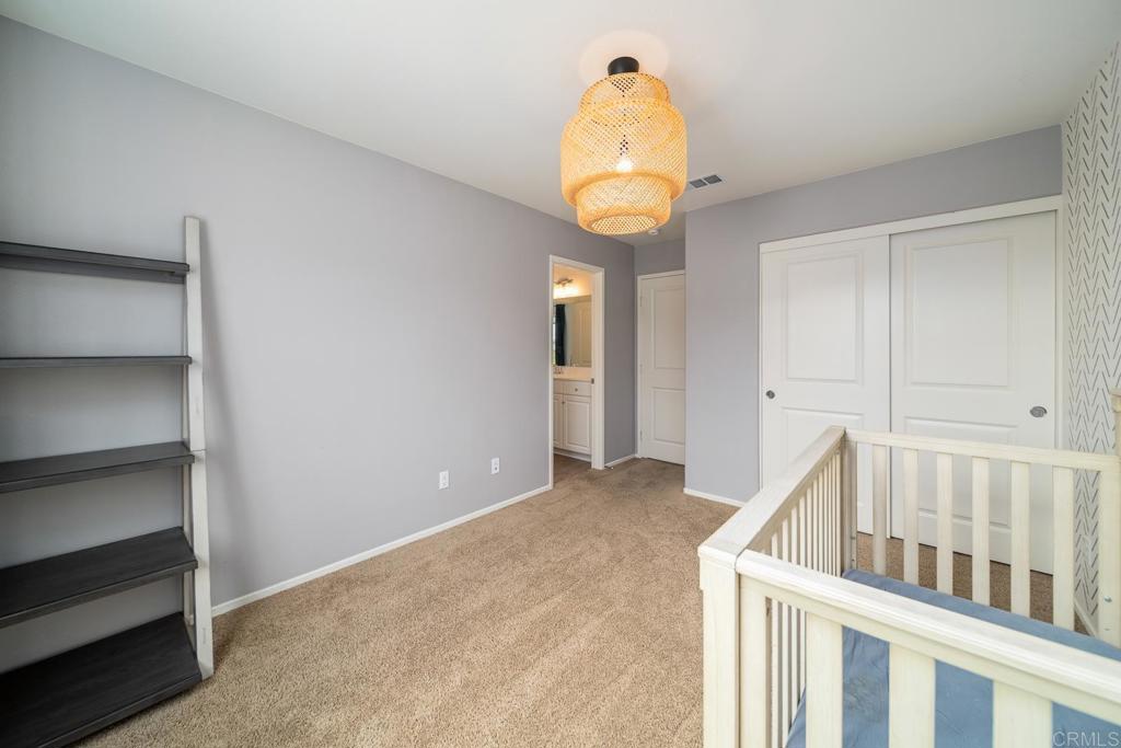 352 Misaki Way Fallbrook, CA 92028 - Photo 32 of 68 a view of a room with wooden floor