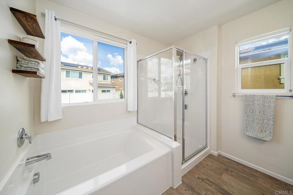 352 Misaki Way Fallbrook, CA 92028 - Photo 44 of 68 a bathroom with a bathtub and a shower