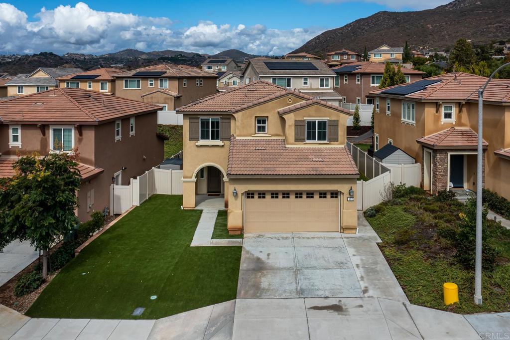 352 Misaki Way Fallbrook, CA 92028 - Photo 45 of 68 a front view of a house with garden
