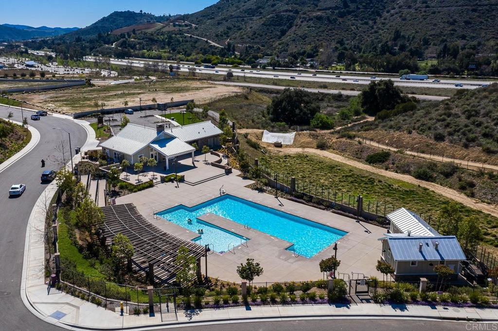 352 Misaki Way Fallbrook, CA 92028 - Photo 65 of 68 a aerial view of a house with a yard and lake view