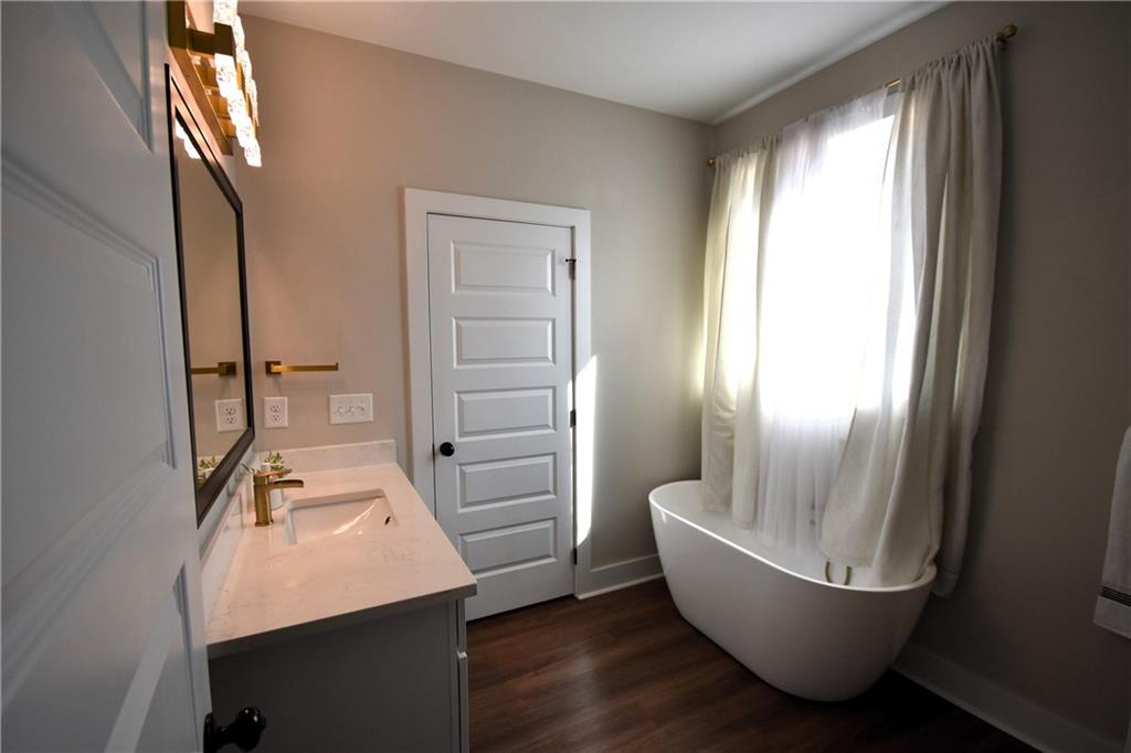 533 Lively Road Waco, GA 30182 - Photo 30 of 41 a bathroom with a sink and mirror
