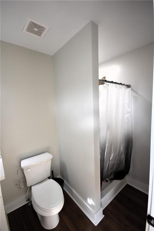 533 Lively Road Waco, GA 30182 - Photo 38 of 41 a bathroom with a toilet and a shower